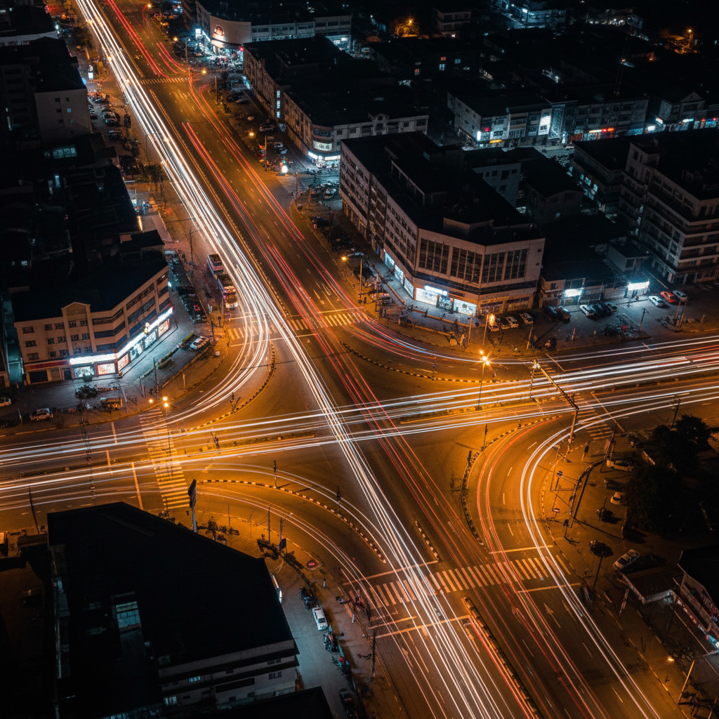 City intersection light trails forming data network patterns